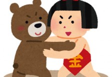熊と相撲をとる金太郎の可愛いイラスト。おとぎ話やこどもの日のデザインに。