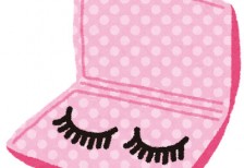 ピンクのドット柄のケースに入ったつけまつ毛のイラスト